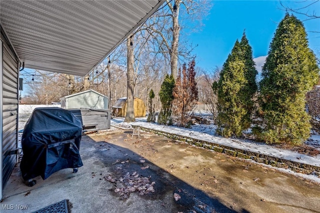 view of yard layered in snow