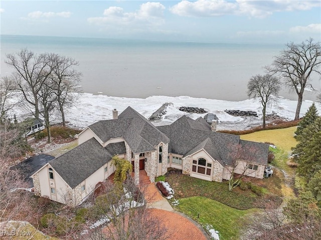 drone / aerial view with a water view