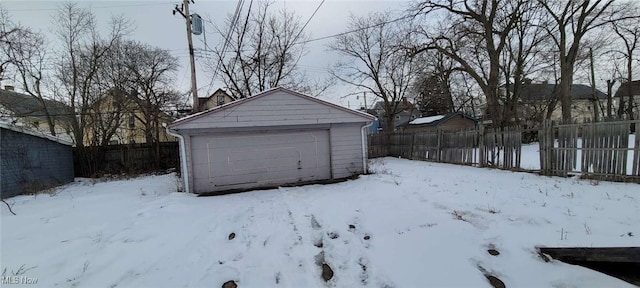 view of snow covered garage