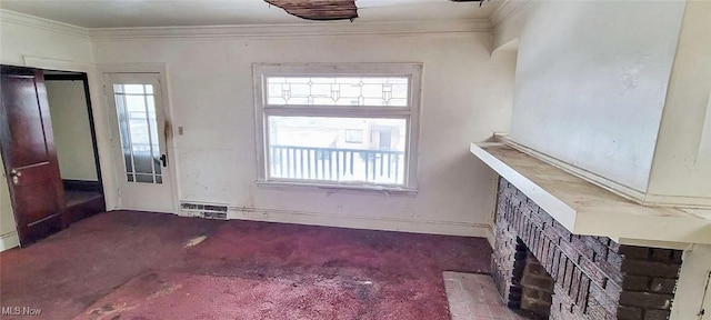 unfurnished living room featuring crown molding and a fireplace