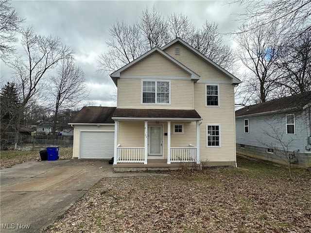 front of property with a garage and a porch