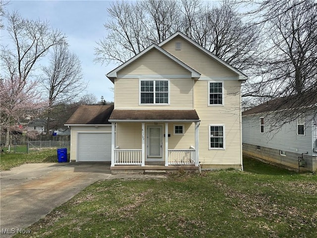 traditional home with a porch, fence, a front lawn, an attached garage, and driveway