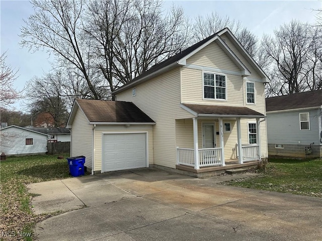 traditional-style house with a porch, a garage, and concrete driveway