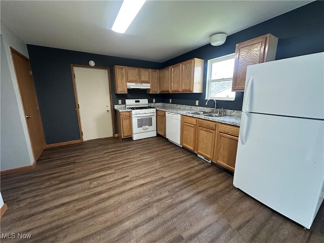 kitchen featuring a sink, light countertops, white appliances, and under cabinet range hood