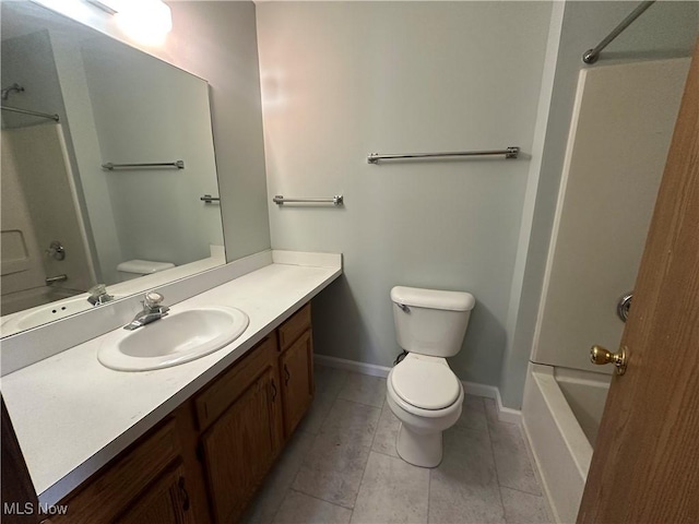 bathroom with toilet, bathing tub / shower combination, and vanity