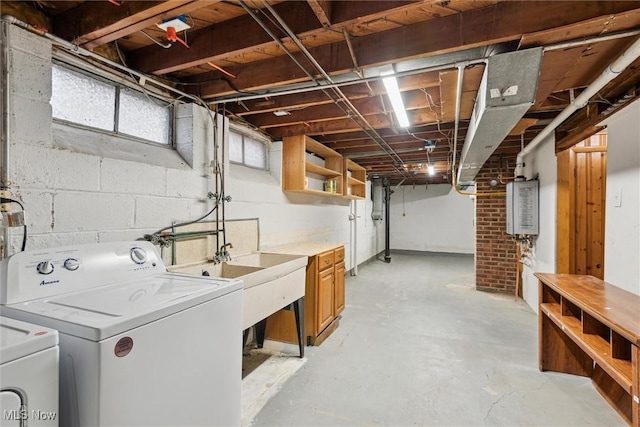 clothes washing area featuring washer and clothes dryer