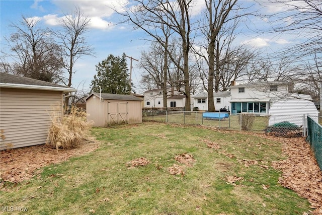 view of yard with a storage unit