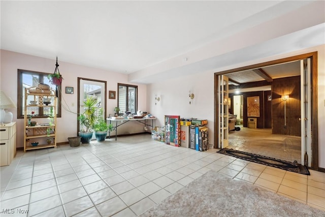 interior space featuring light tile patterned flooring