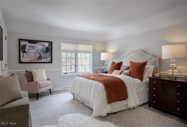 bedroom featuring light hardwood / wood-style floors