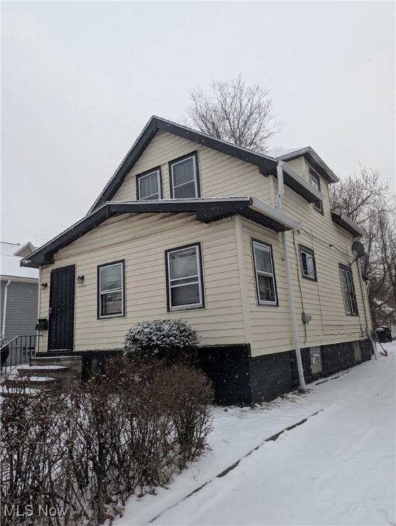 view of snow covered property