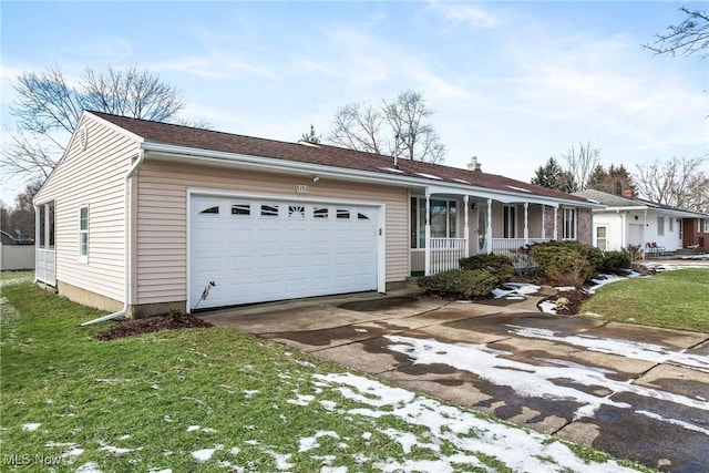 ranch-style house with a garage, a front yard, and covered porch