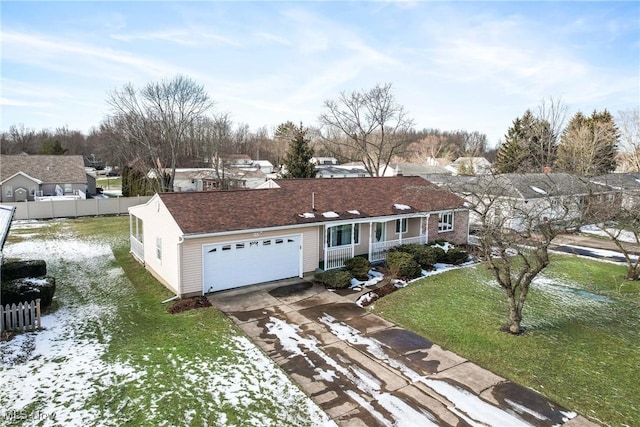 single story home with a garage and a front yard