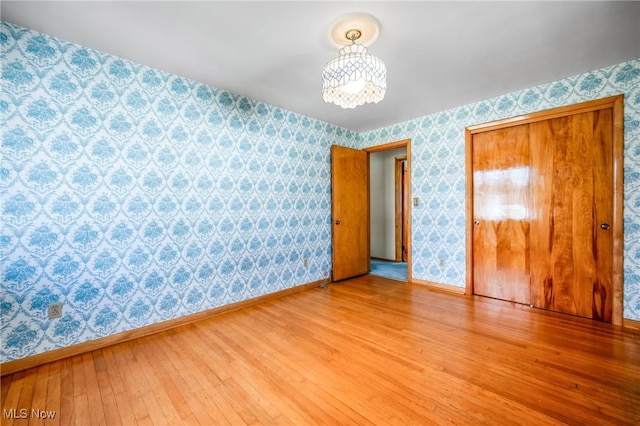 unfurnished bedroom featuring light hardwood / wood-style floors