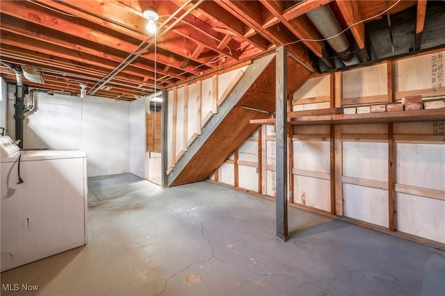 basement featuring washer and clothes dryer