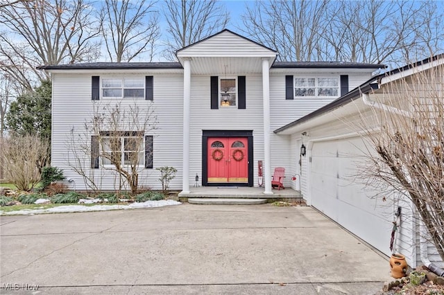 view of property featuring a garage