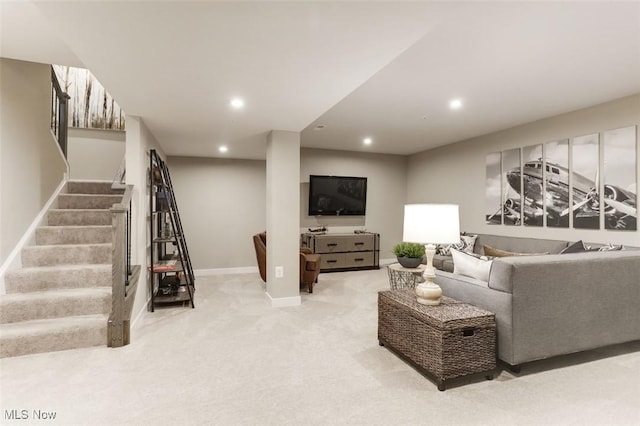 living room featuring light carpet