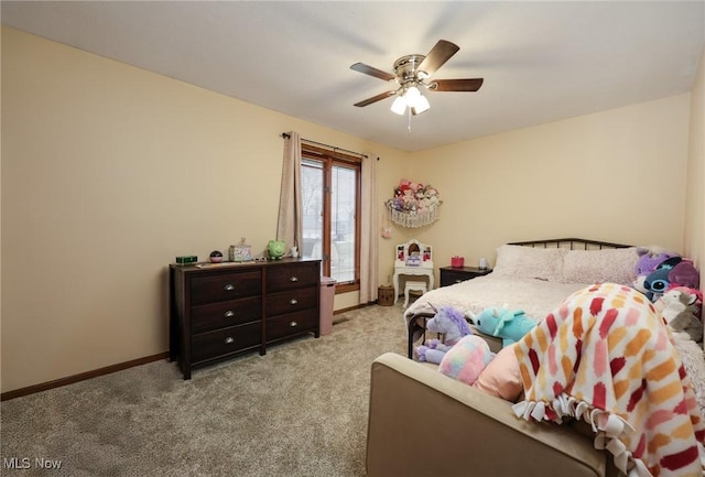 bedroom with light colored carpet and ceiling fan