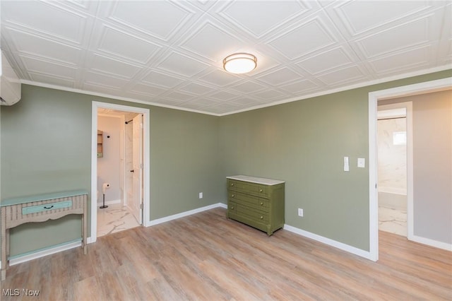 interior space featuring connected bathroom and light wood-type flooring