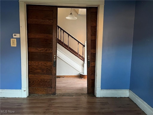 interior space with hardwood / wood-style floors