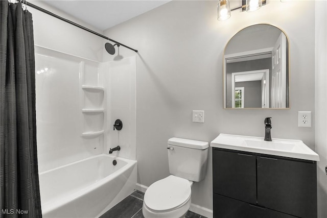 full bathroom featuring shower / bath combo, vanity, and toilet