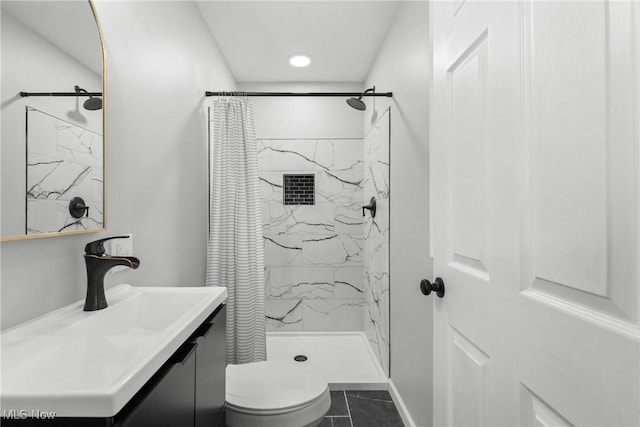 bathroom featuring vanity, a shower with curtain, and toilet