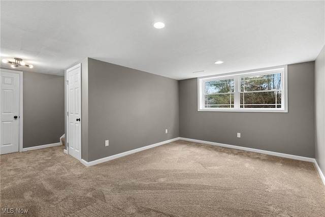 empty room with carpet flooring