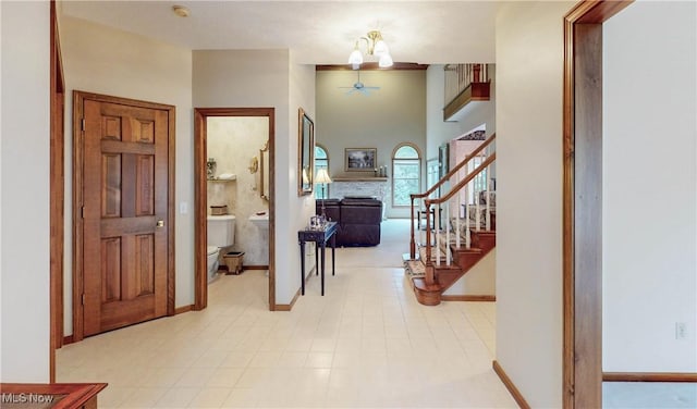 entrance foyer featuring a towering ceiling