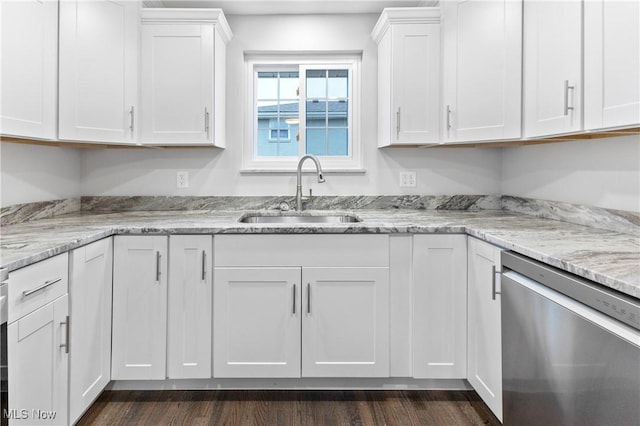 kitchen featuring white cabinetry, dishwasher, sink, and light stone counters