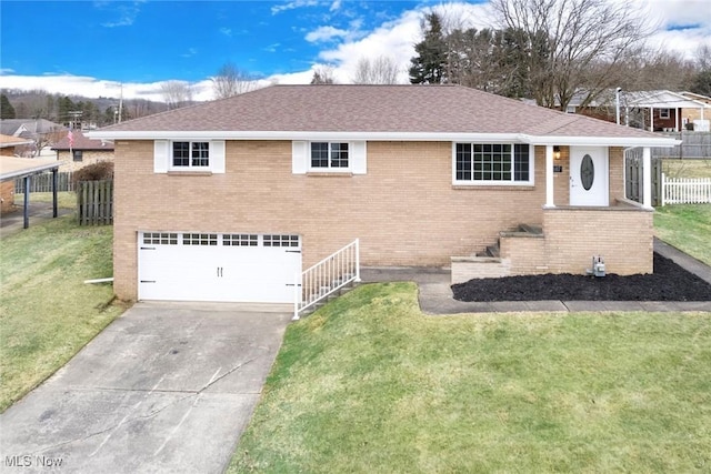 view of front facade featuring a garage and a front lawn