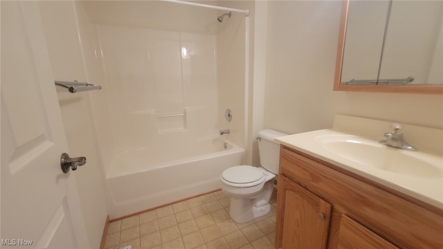 full bathroom with tile patterned flooring, vanity, washtub / shower combination, and toilet