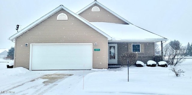 view of front of property featuring a garage