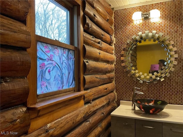 wine cellar with sink and log walls