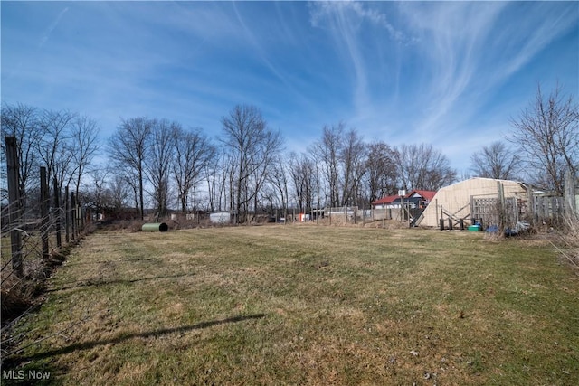 view of yard with fence