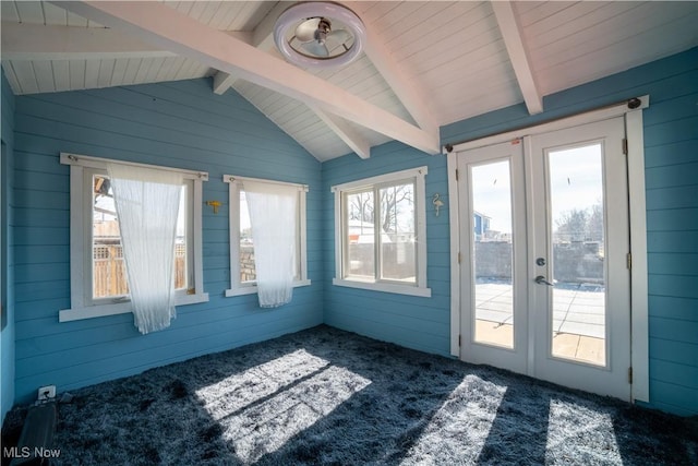 unfurnished sunroom with french doors and lofted ceiling with beams