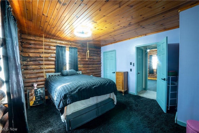 carpeted bedroom featuring wood ceiling, rustic walls, and baseboards