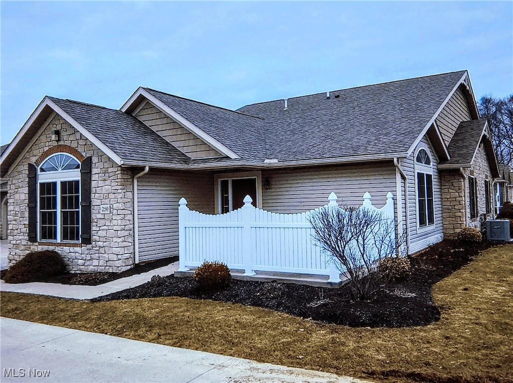 view of front of house with central AC unit