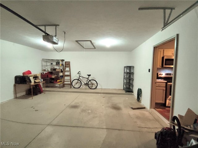 garage featuring a garage door opener