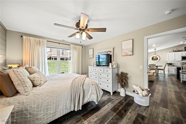 bedroom featuring dark wood-type flooring and ceiling fan