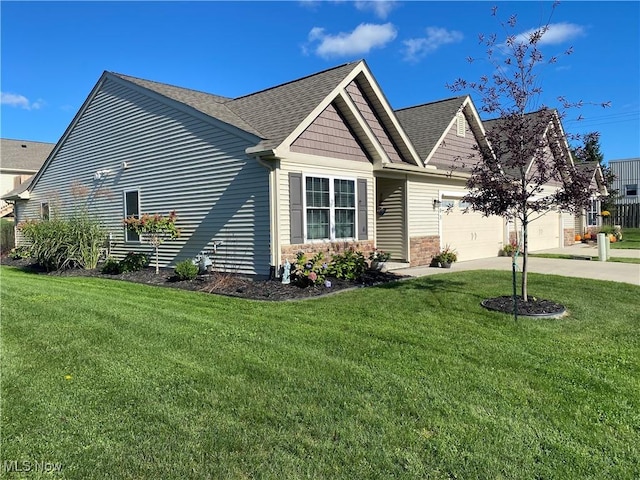 view of home's exterior with a garage and a yard