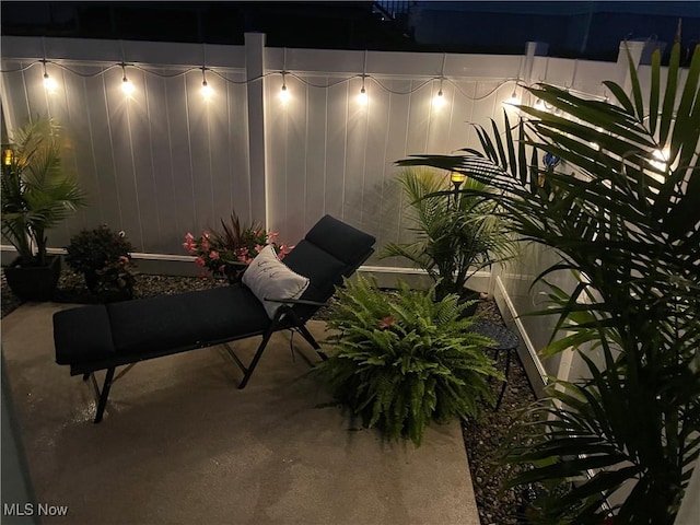 view of patio at twilight