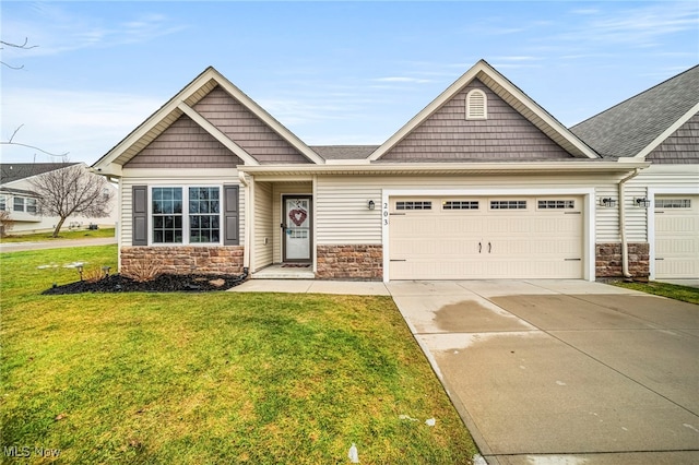 craftsman inspired home featuring a garage and a front yard