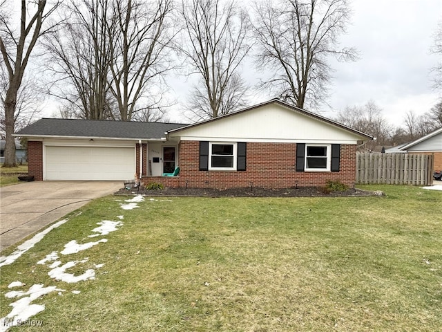 view of front facade with a garage and a front yard