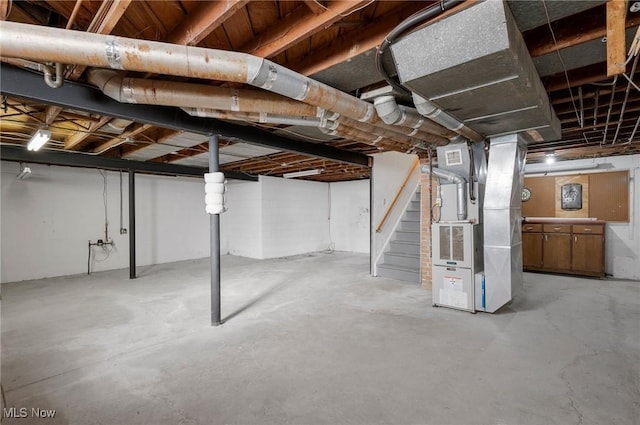 basement featuring heating unit