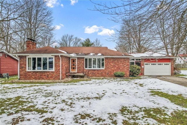 single story home with a garage