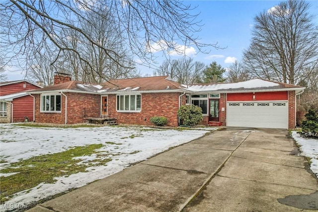 ranch-style home with a garage