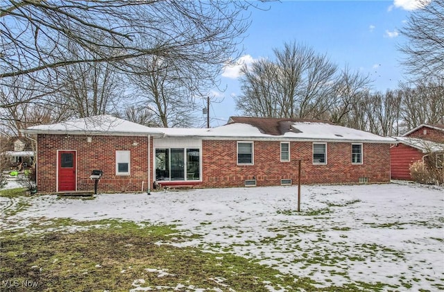 view of snow covered property