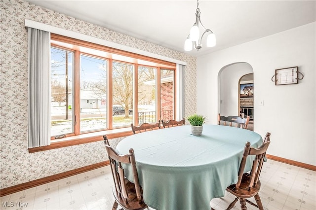 dining room with a chandelier