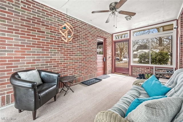 sunroom / solarium with ceiling fan