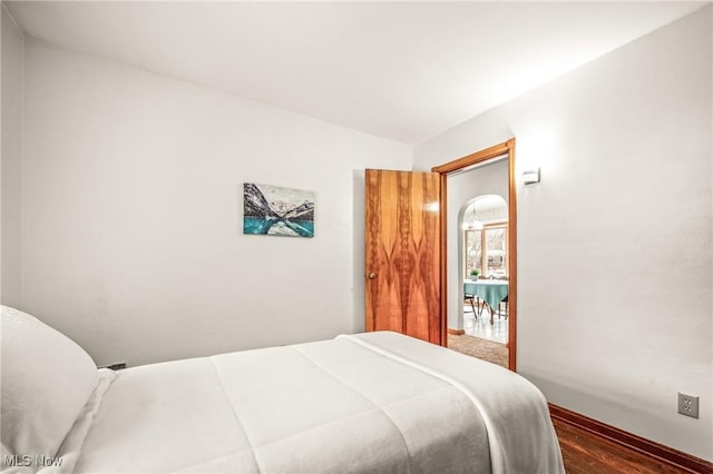 bedroom featuring hardwood / wood-style flooring