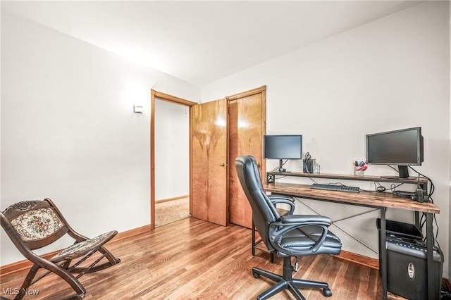 office space featuring hardwood / wood-style floors